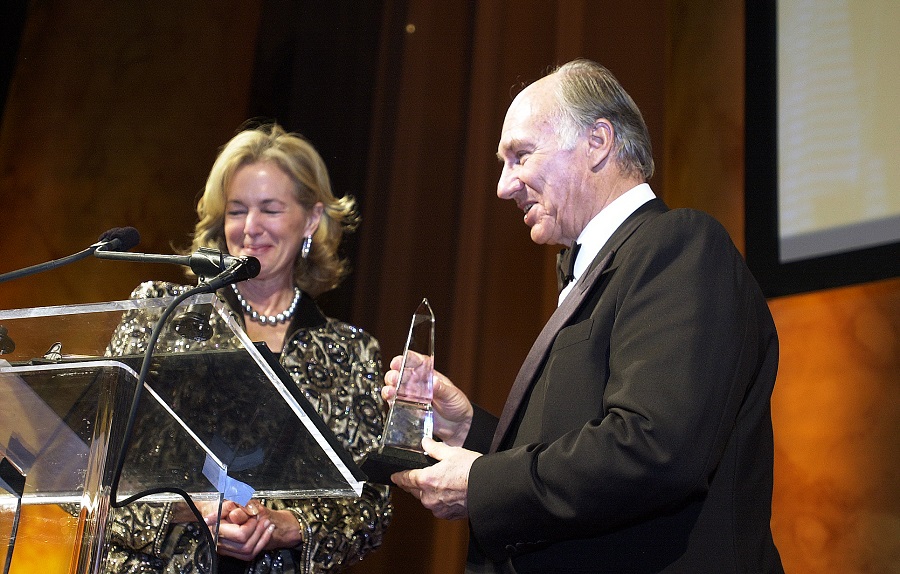 Carolyn Schwenker Brody, Chair of the National Building Museum's Board of Trustees, presents the Vincent Scully Prize, a crystal obelisk, to His Highness the Aga Khan. | AKDN / Zahur Ramji