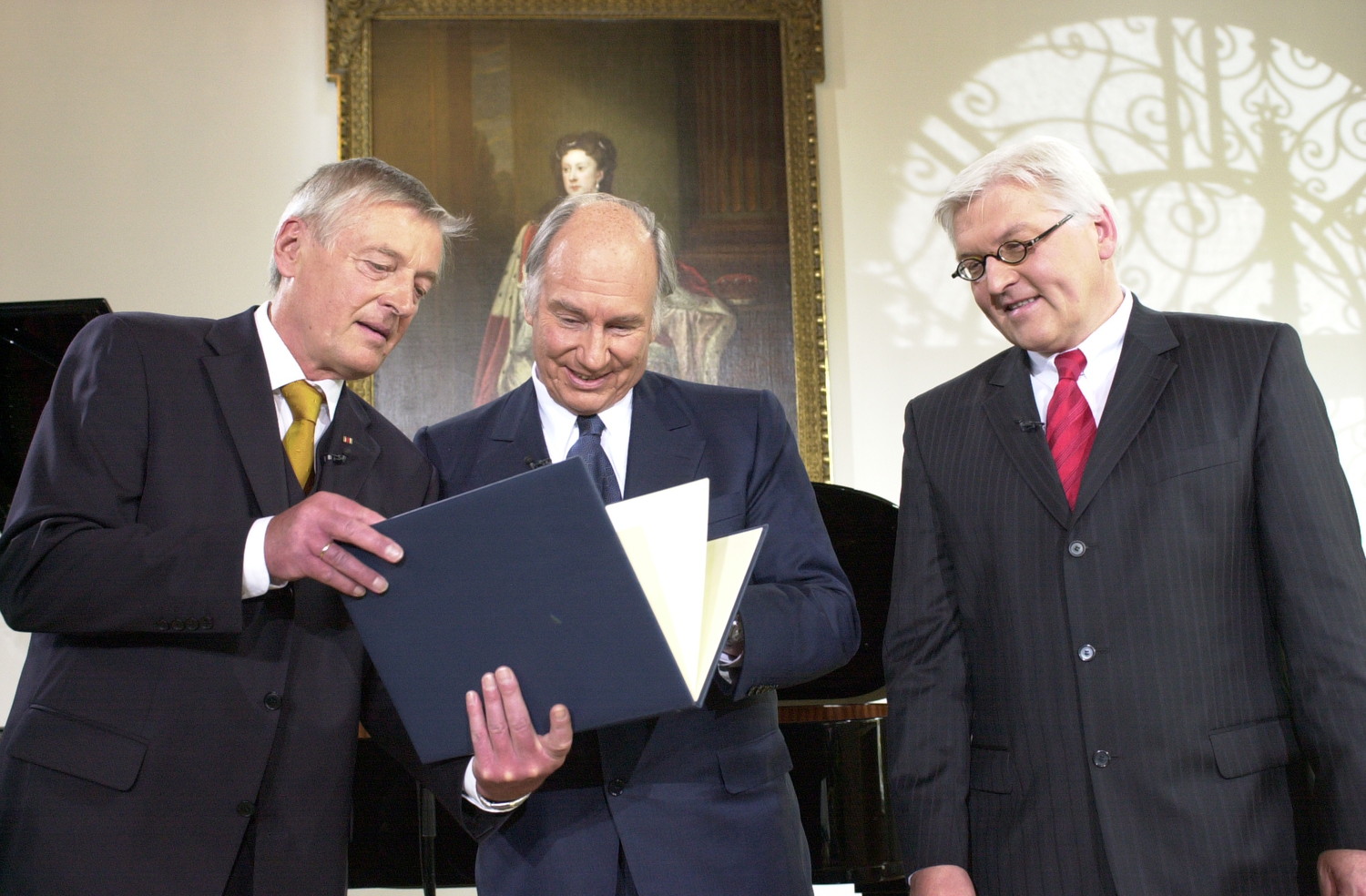 Dr. Friedemann Greiner, Director and Chairman of the Jury (left), presenting the Tolerance Award 2006 to His Highness the Aga Khan as Dr Frank-Walter Steinmeier, Germany's Minister of Foreign Affairs (right), looks on. The Tolerance Award was established by Germany’s Evangelische Akademie Tutzing in 2000 and is presented every second year to an individual whose life work is committed to building greater understanding and tolerance between different cultures and traditions. During his laudatory address, Dr Steinmeier described the Aga Khan as a “fortress for democratic progress, as someone wishing to bring about sustainable, pluralistic, civil societies…We honour an exceptional man, we honour a huge friend of humankind, we honour a courageous visionary and we honour a person building bridges between societies,” Photo: AKDN/Zahur Ramji.