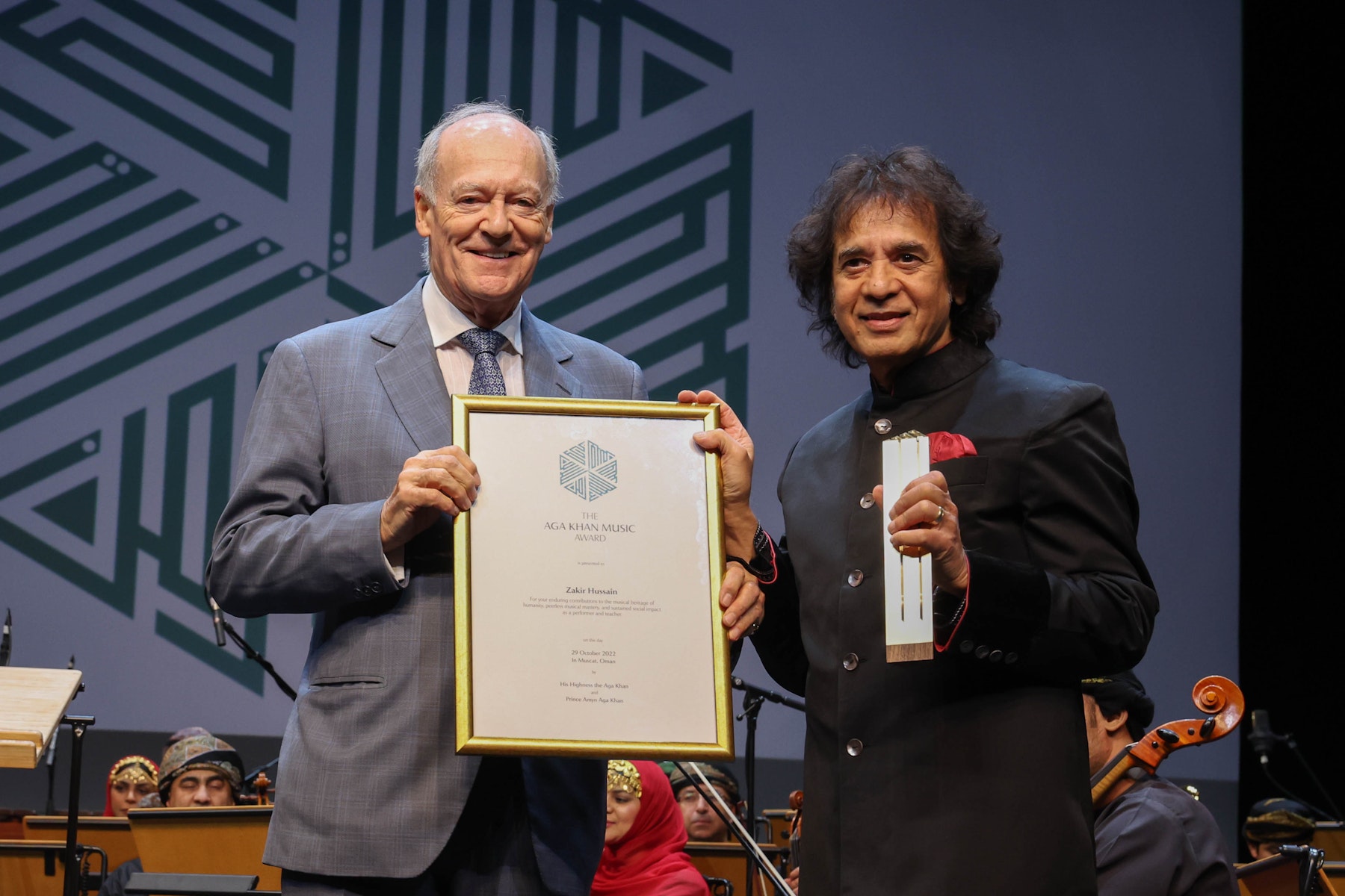 Prince Amyn Aga Khan presents the 2022 Aga Khan Music Award for Lifetime Achievement to Zakir Hussain in Muscat, Oman on October 29, 2022. bARAKAH