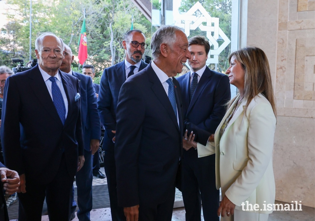 Newly appointed President of His Highness the Aga Khan Shia Imami Ismaili Council for Portugal, Yasmin Bhudarally, welcomes President Marcelo Rebelo de Sousa to the Ismaili Centre Lisbon on July 13, 2023 to celebrate its 25th anniversary. Looking on (from left to right) are His Highness the Aga Khan's younger brother Prince Amyn, and his two sons Prince Rahim and Prince Aly Muhammad.